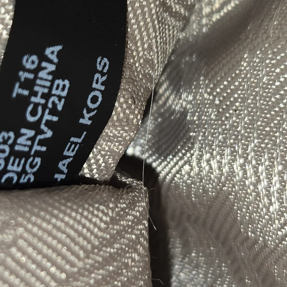 Michael Kors Jet Set Mutifunctial Brown Travel Tote Bag
